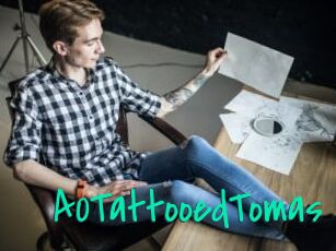 A0TattooedTomas